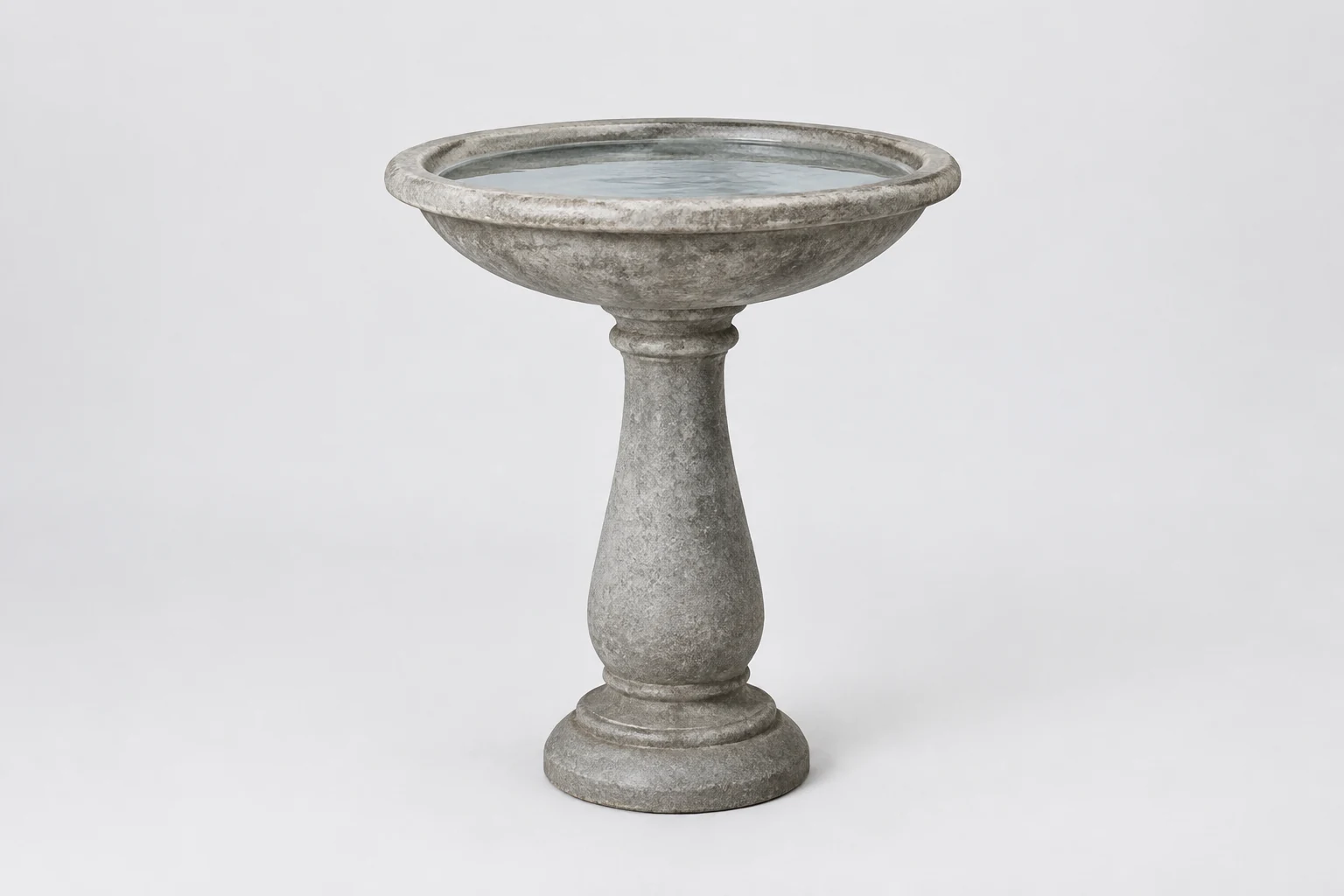 Stone-effect pedestal bird bath